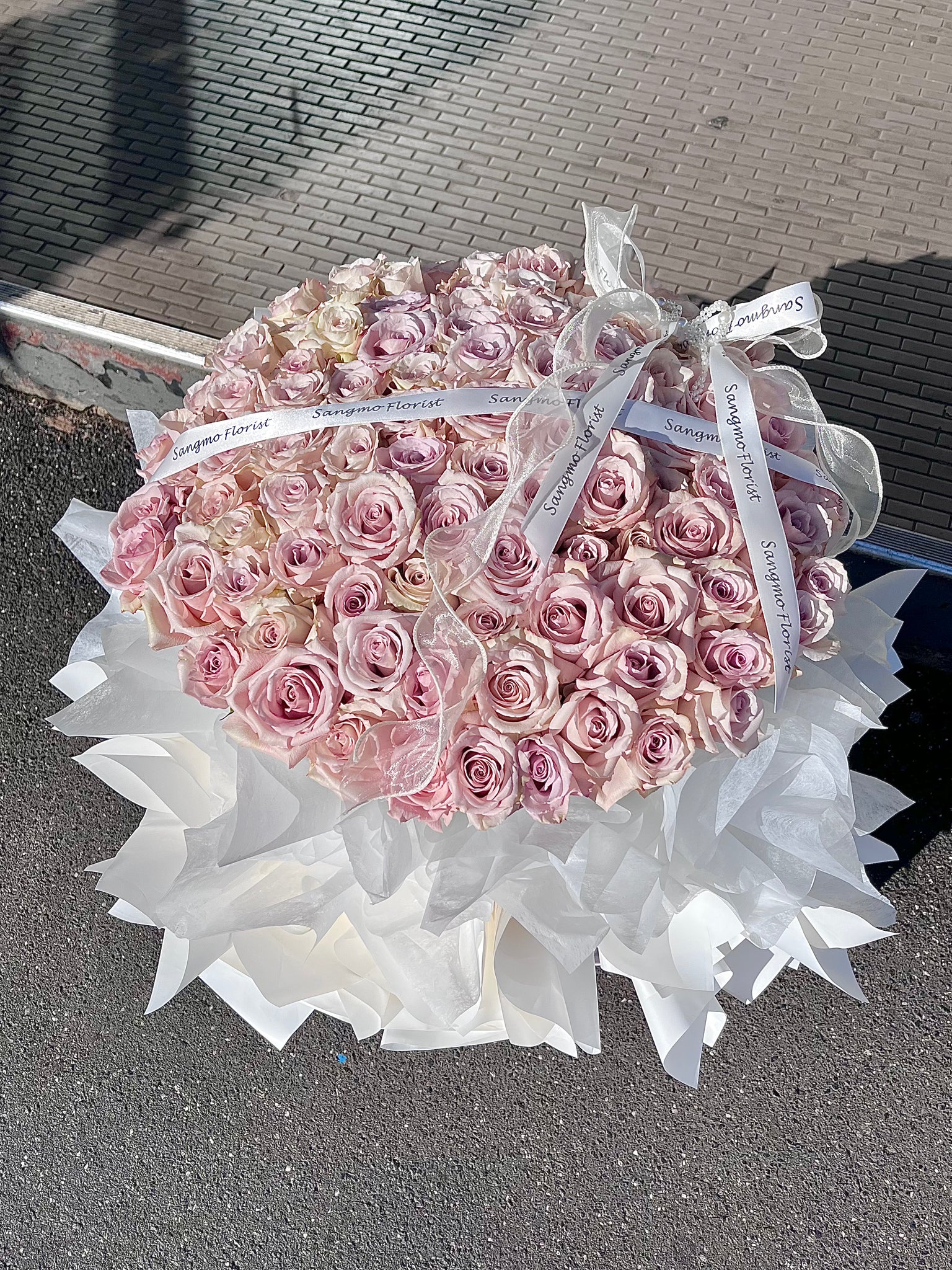 99 stems Ecuador Quicksand rose bouquet.